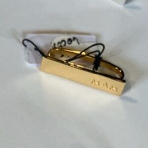 NWT MAM gold tone logo pendant